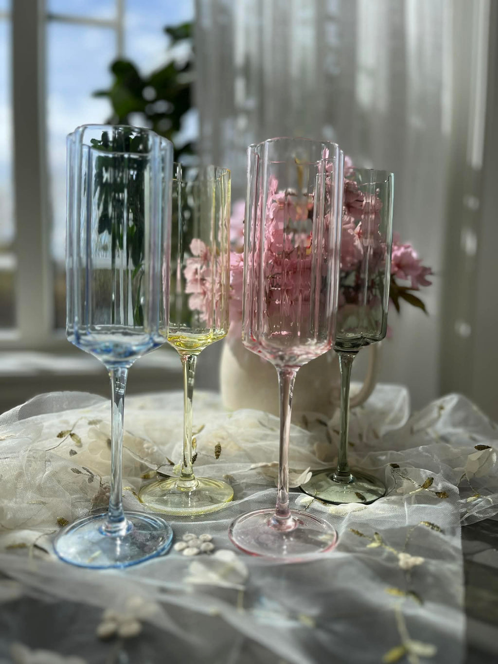 Utleie -champagnelass i pastellfarger
