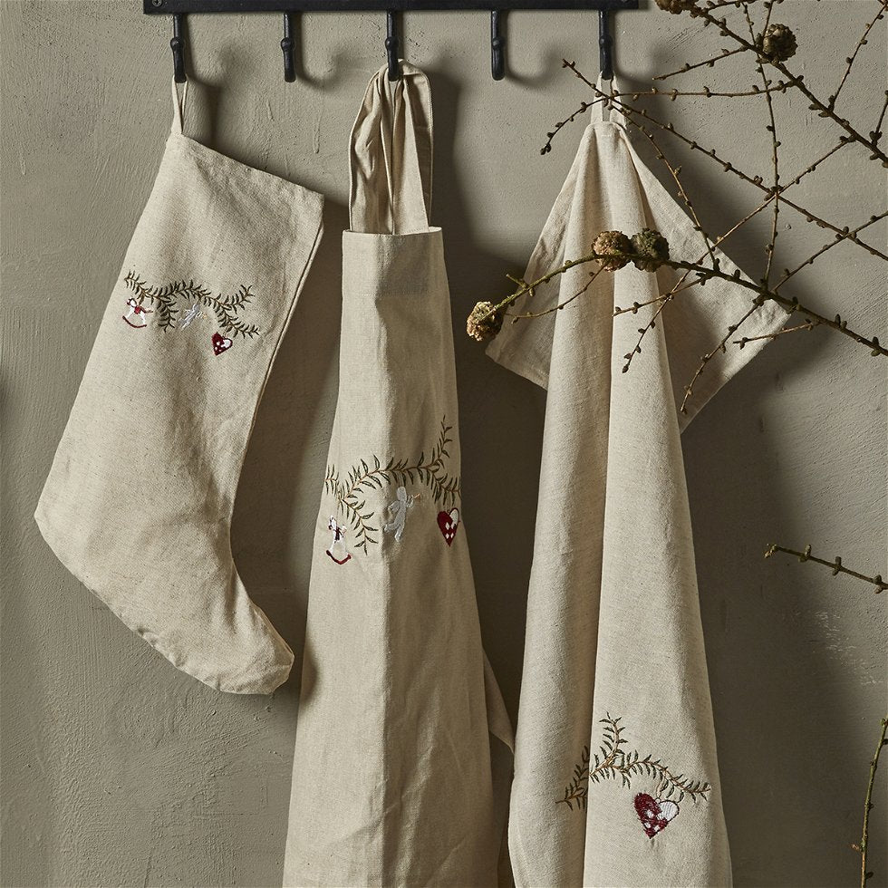 Forkle med julemotiv – brodert bomull