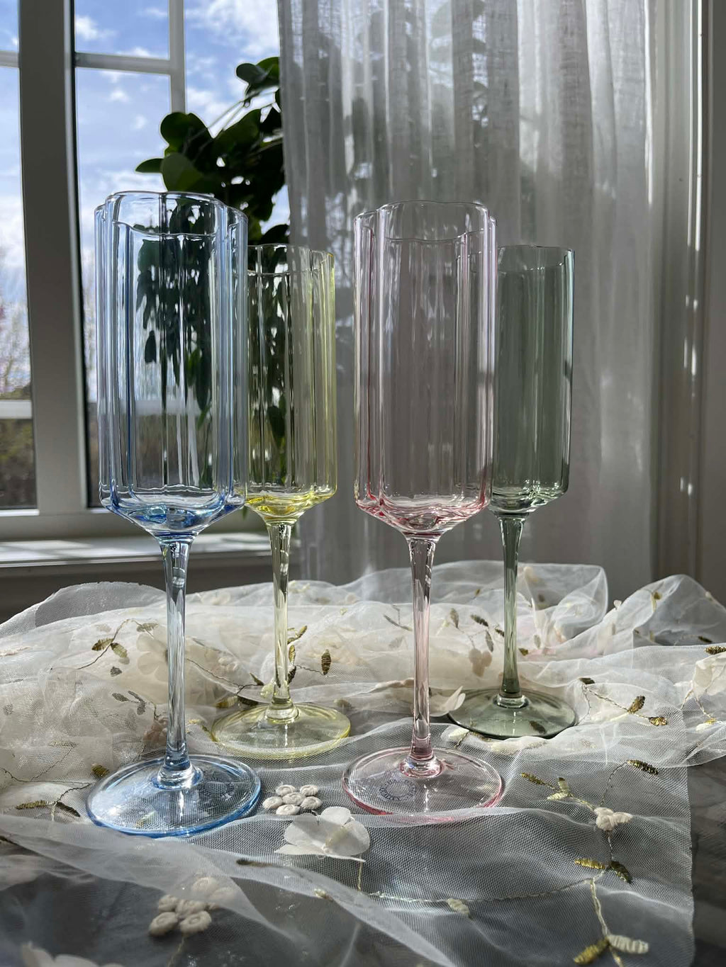 Utleie -champagnelass i pastellfarger