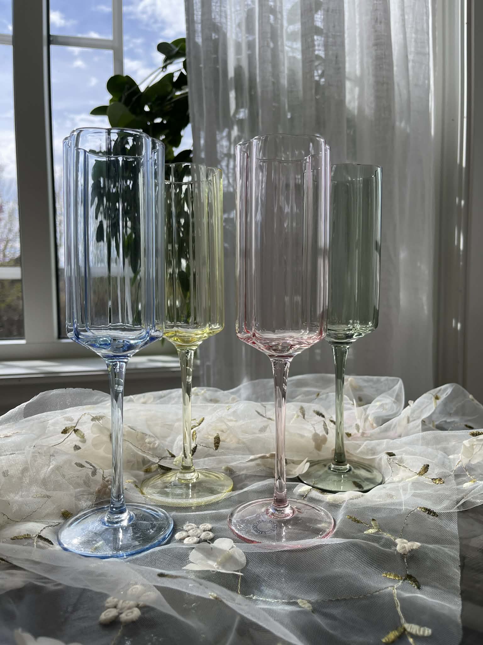 Utleie -champagnelass i pastellfarger