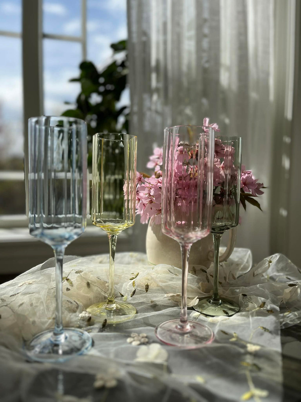 Utleie -champagnelass i pastellfarger