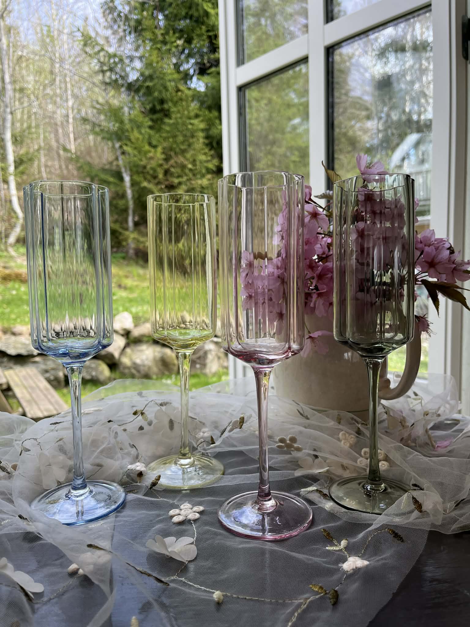 Utleie -champagnelass i pastellfarger